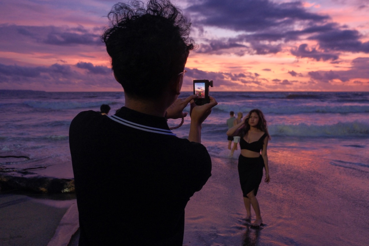 PEOPLE - Taking the perfect sunset photo at Berawa Beach