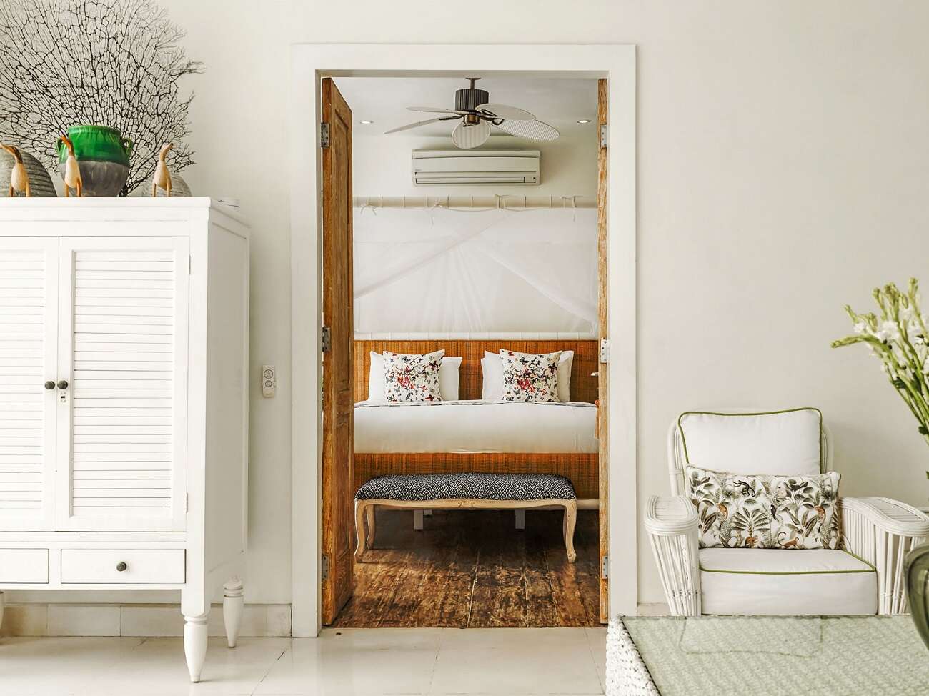 022-Villa-Jajaliluna-Living-Area-Peaking-Master-Bedroom-1